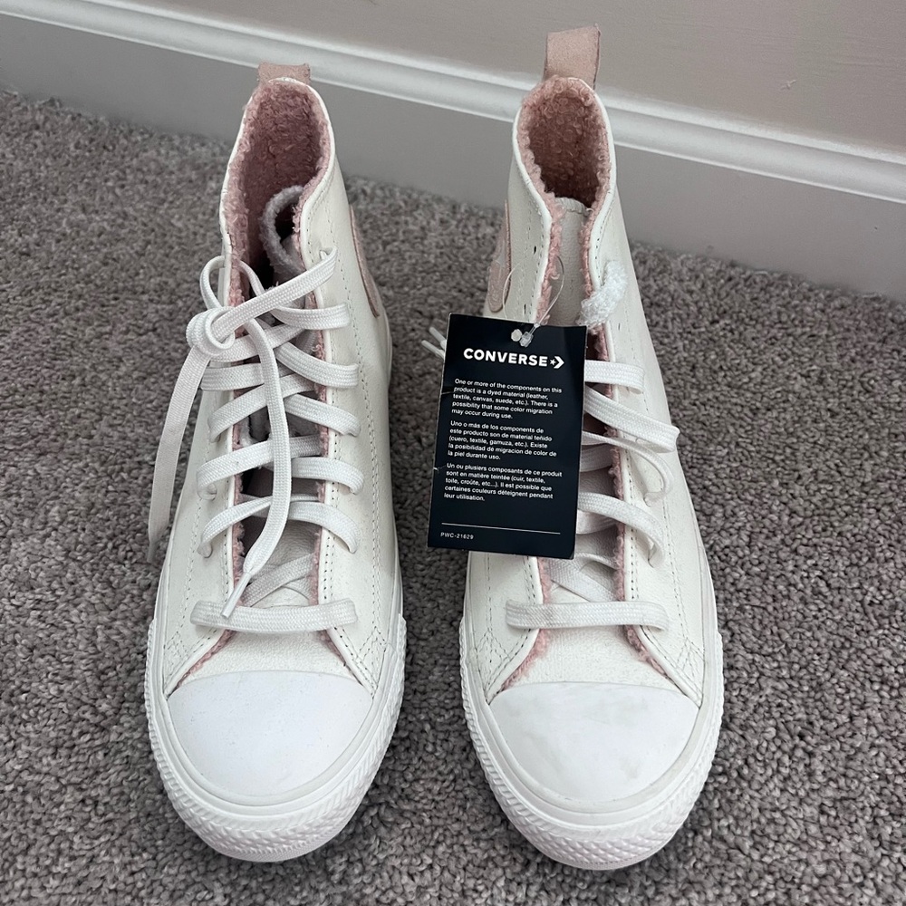 Woman’s High Top Leather Converse